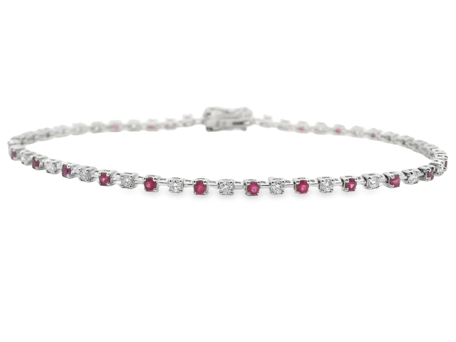 PULSERA 18KT 25 BRILLANTES 25 RUBÍES - Centeralia Plus S.L