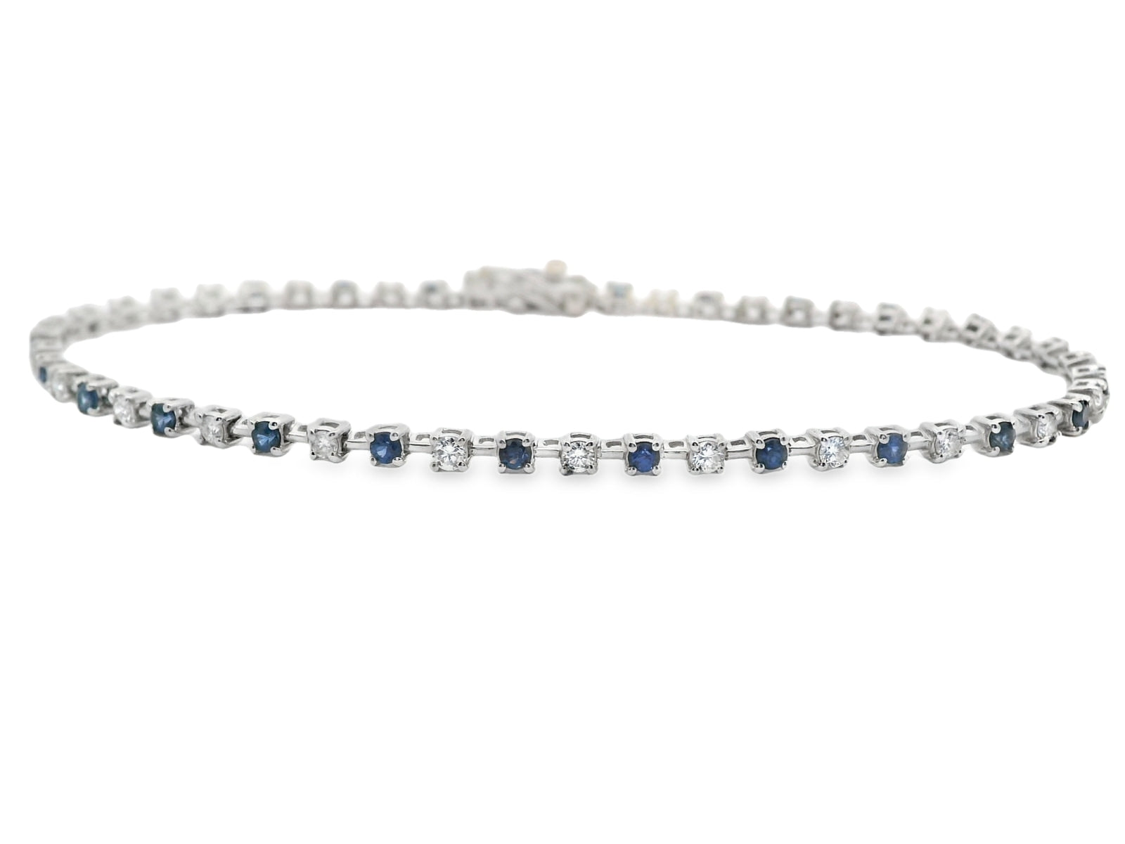 PULSERA 18KT 25 BRILLANTES 25 ZAFIROS - Centeralia Plus S.L